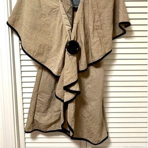 Vest is new with tags, large lapels , cinch waist xl